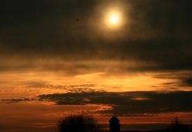 church on the background of a mystical sunset