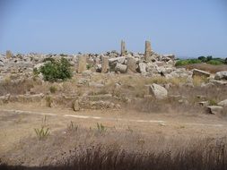 ancient ruins of temple with columnar