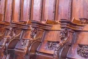 wooden carved pews in church