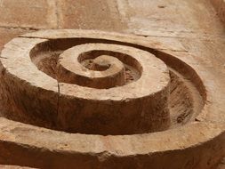 strikingly beautiful spiral carved stone