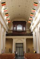 national flags in a church in Belgium