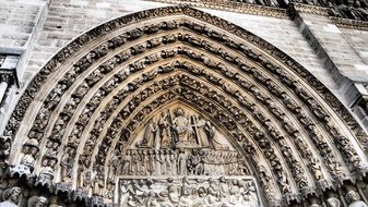 arches on the wall of a parisian church