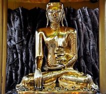 golden buddha statue near the wall, myanmar, Yangon, Shwe Dagon Pagoda