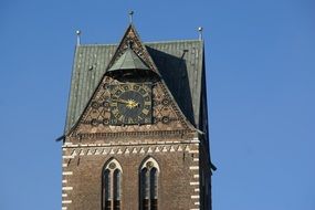 the clock on the tower of the Marienkirche in Wismar