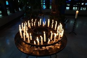 candles placed in a circle in the church