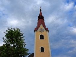 clock on the tower of the Catholic Church