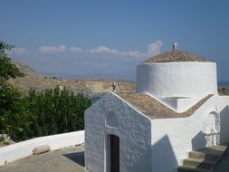 White church on the landscape in Greece