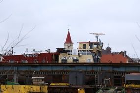 port in foreground of church in nowa sol