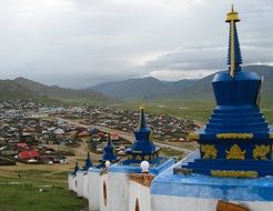 buddhist temple with blue spiers in mongolia