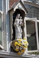 holy spiritual as a sculpture on a facade