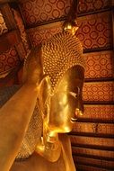 golden buddha as decoration of a temple