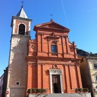 facade of historic church at blue sky, italy, pennabilli