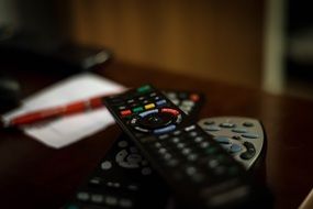 folded remotes on the table
