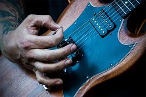 musician playing electric guitar