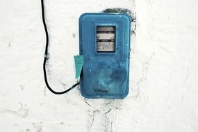 Electricity meter, blue box on wall