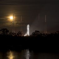 spacecraft rocket launch pad night