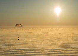 landing a spaceship above the clouds