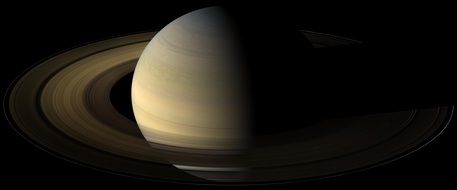 Saturn planet in the darkness of space