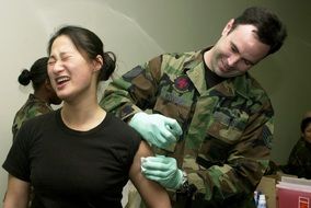 doctor vaccinates a patient