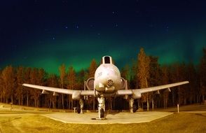 military planes on the background of the polar night in Alaska