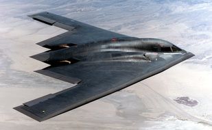 military stealth bomber jet flying