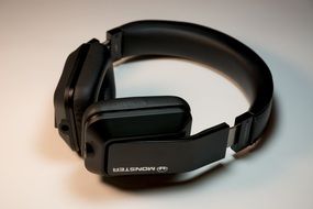 black wireless Monster headphones