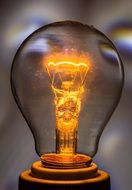 light bulb at burn glow lamp dark