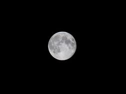 full moon on black background