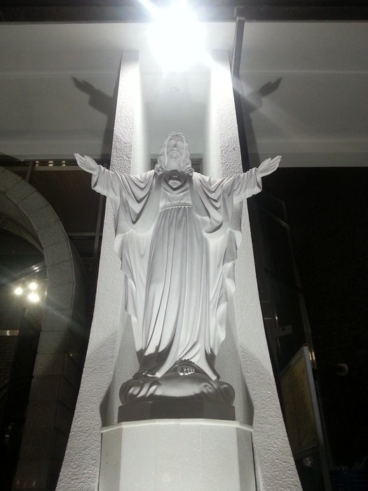 jesus as an angel in sculpture