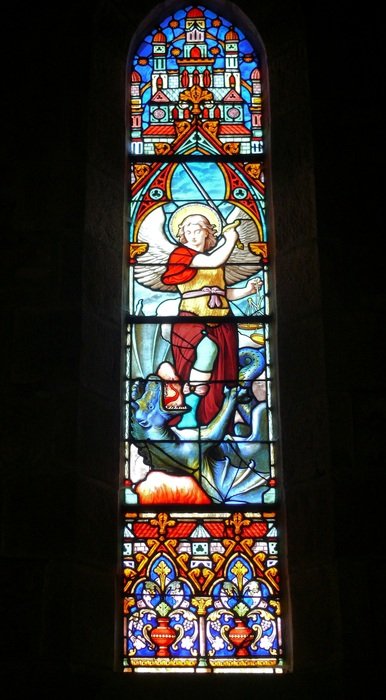 Oblong stained-glass window in the church