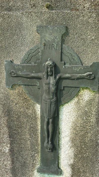 stone engraving in the form of Jesus on the cross