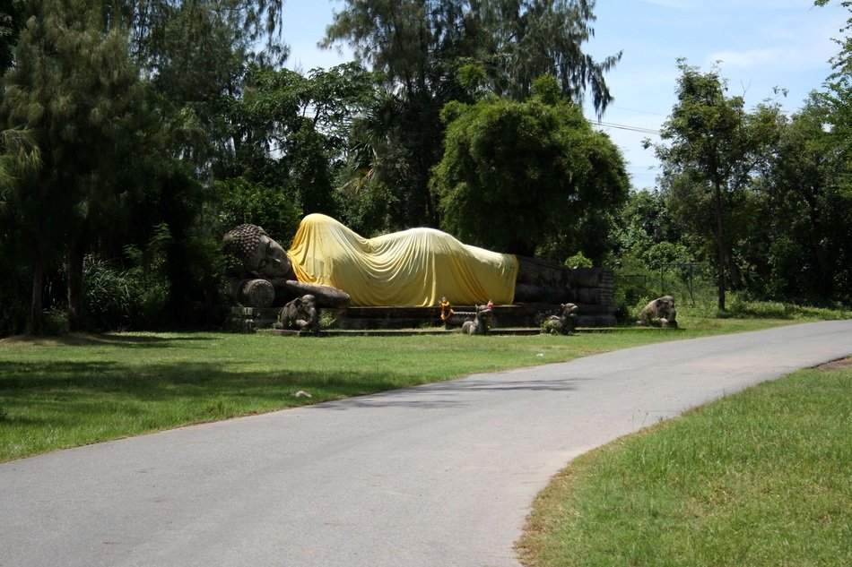reclining buddhist statue in the street