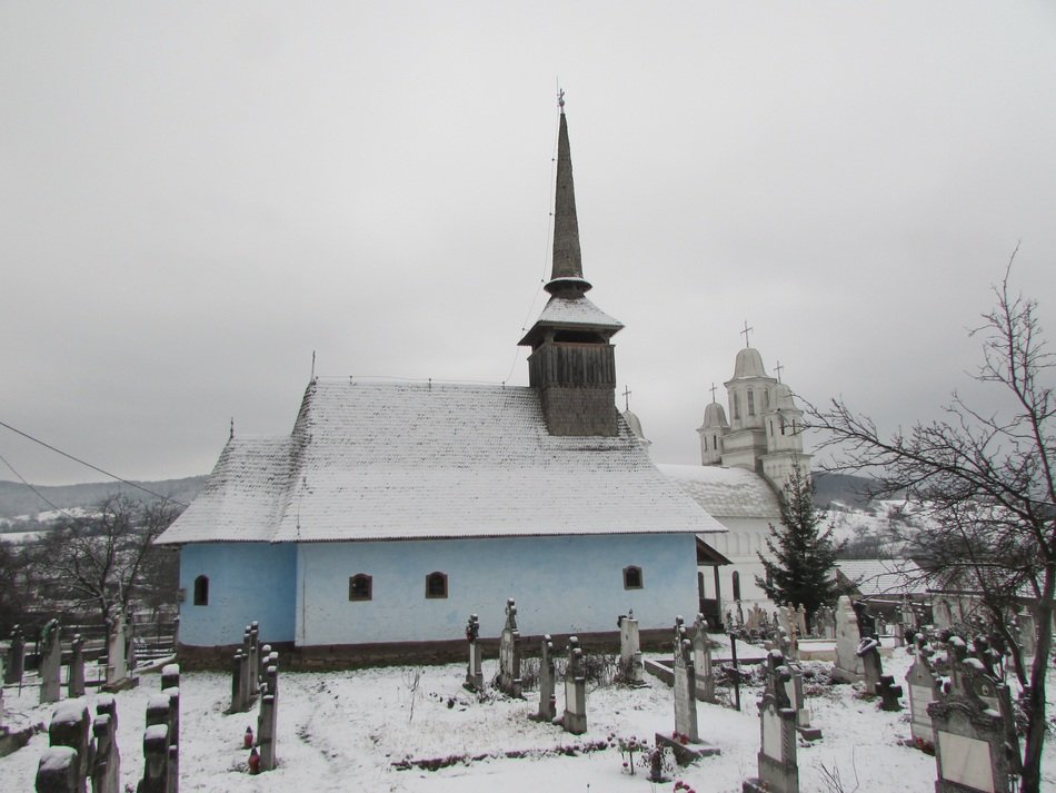 panorama of the church and cemetery in the winter in Transylvania