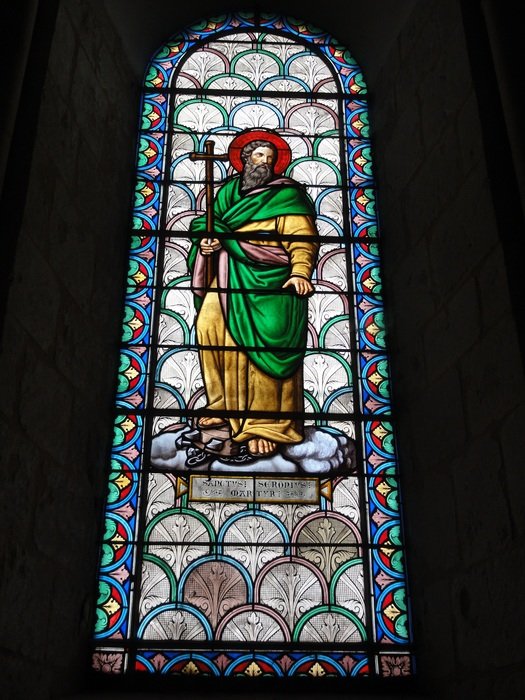 window in the church with the image of the saint