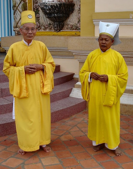 monk in yellow dress in Cambodia