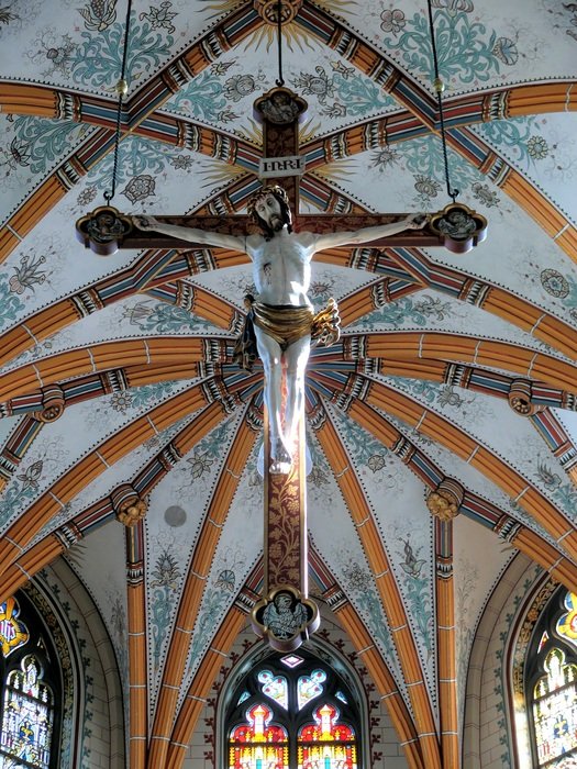 crucifix under the dome of the church