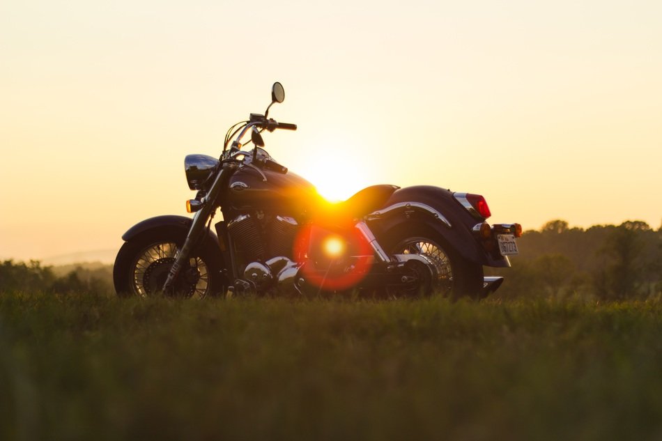 retro styled motorbike on a sunset