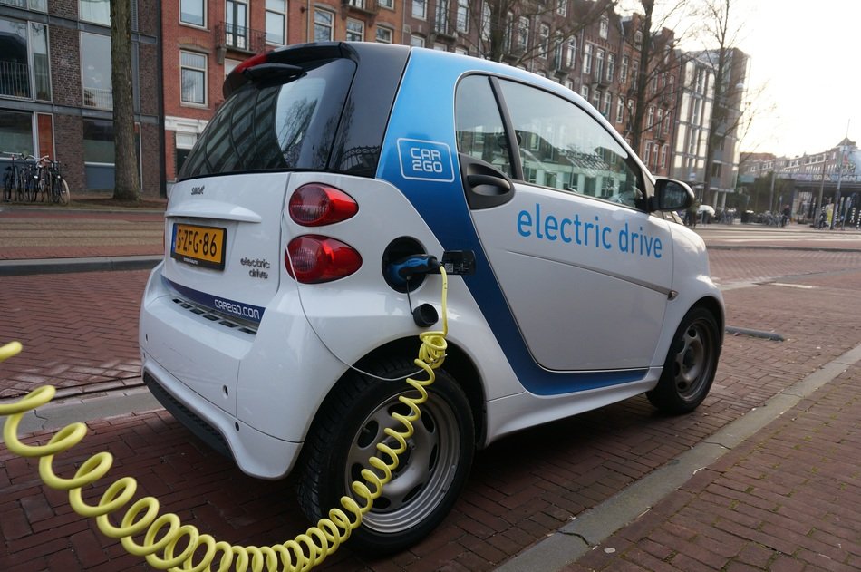 electric car charging on a street in Amsterdam