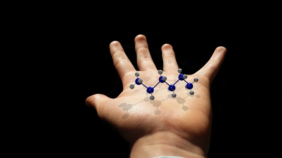 molecule on the palm of the hand