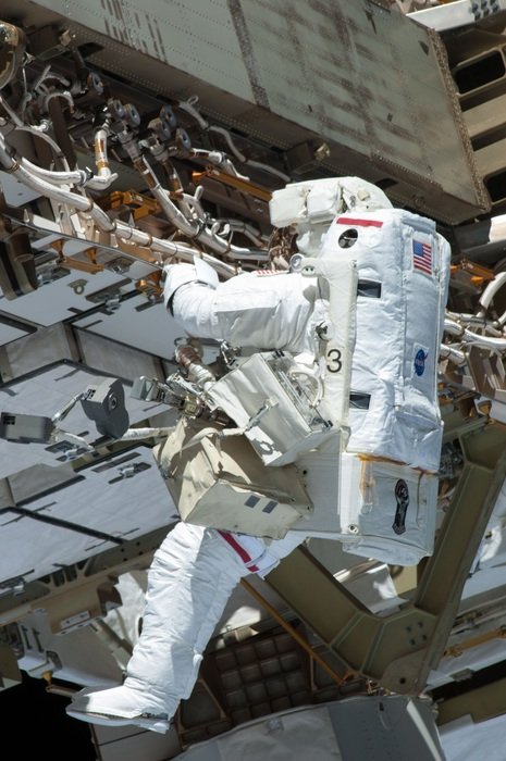 astronaut is serving equipment