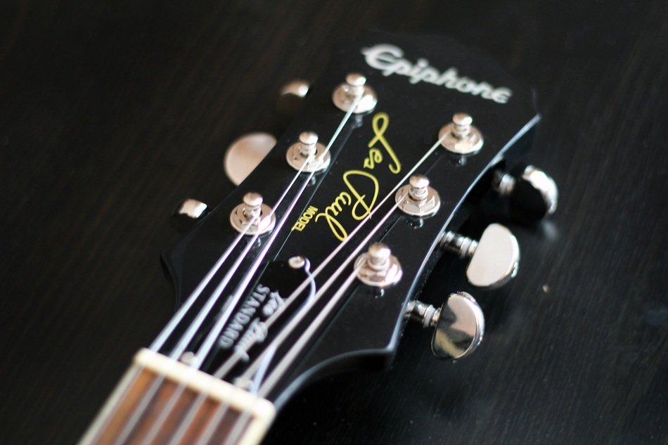 electric guitar edge on black background