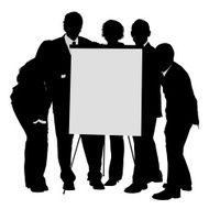 Business team posing behind blank flip chart