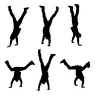 Agile men standing on hands