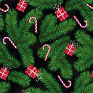 Christmas pattern made of fir branches gifts and candies