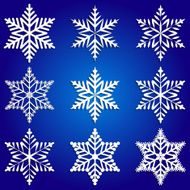 Vector abstract set of white snowflakes on blue background