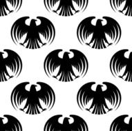 Heraldic seamless pattern of black eagles
