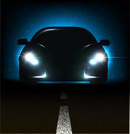 Silhouette of car with headlights on asphalt dark background