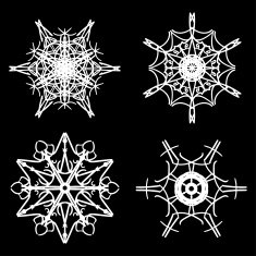 Set of drawn snowflake silhouettes