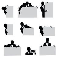 Businesspeople holding up blank poster boards N2