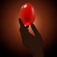 Easter background with hand keeping red holiday egg